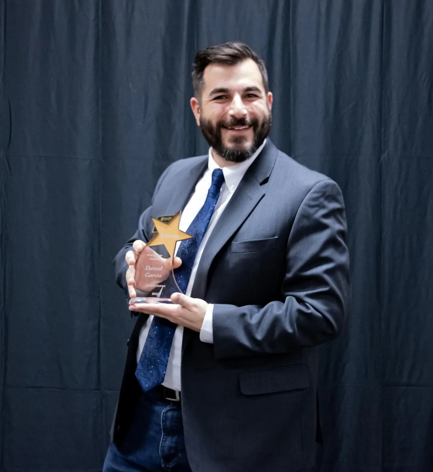 Daniel winning the Rising Star Award at the Evans Area Chamber of Commerce