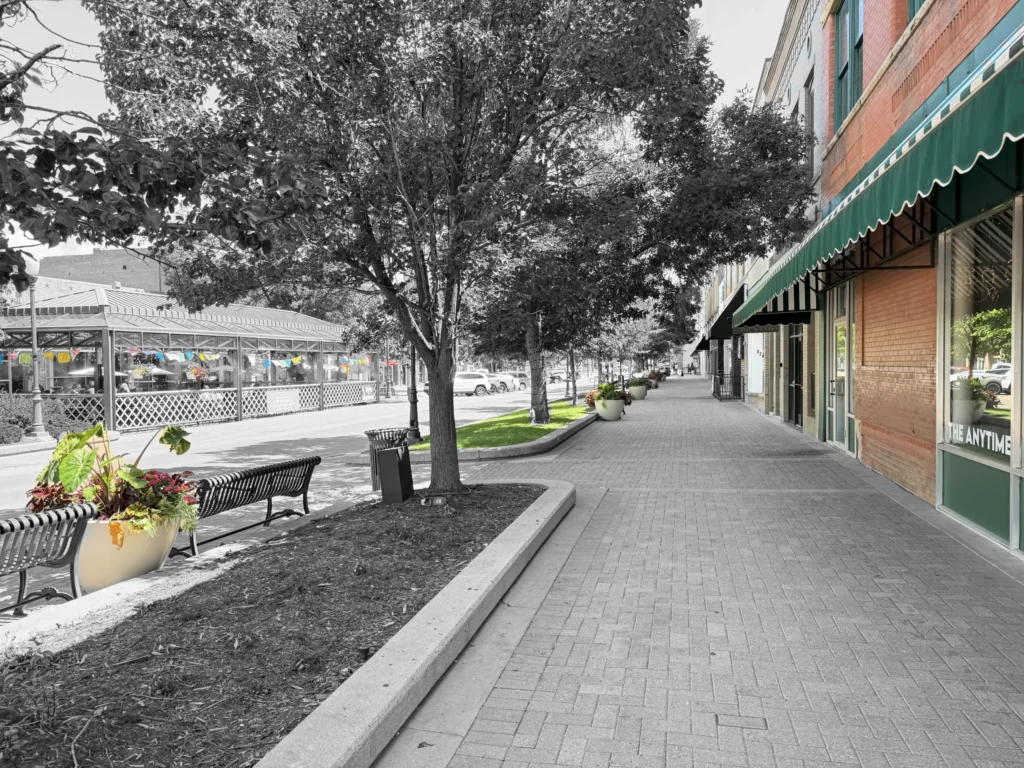 Greeley 9th Ave Plaza black and white image with pops of color